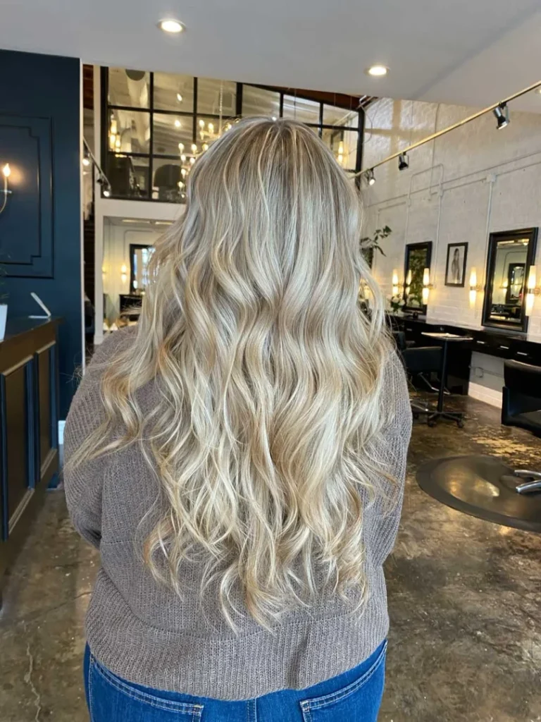back view of Women with blonde Base Color Treatment