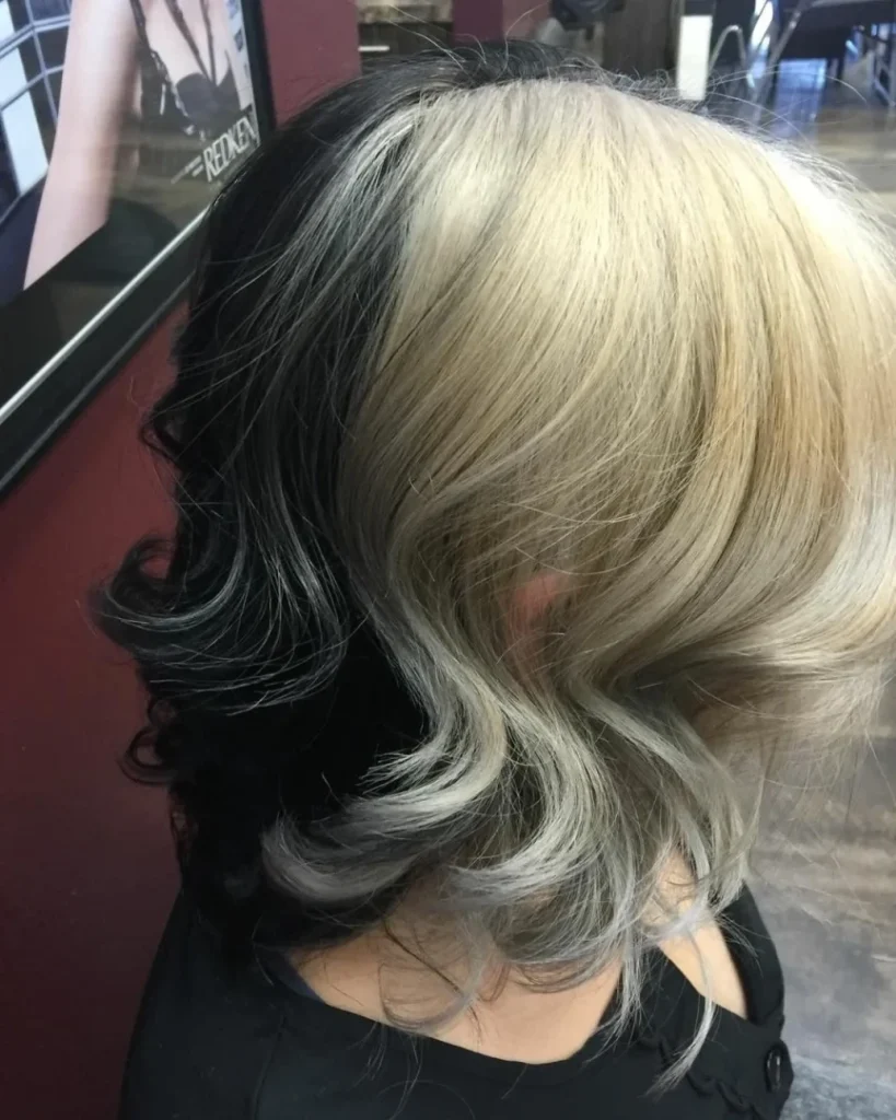 Women with half black and half blonde Base Color Treatment